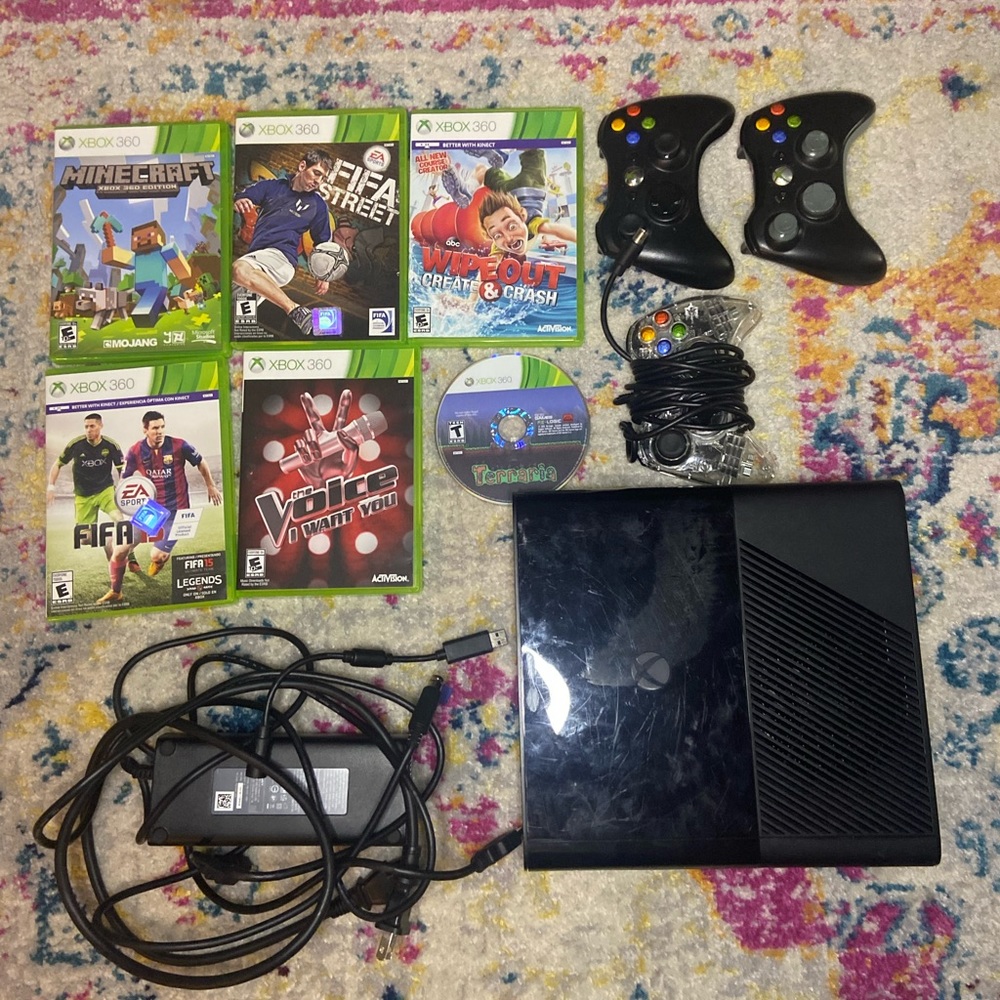 XBOX 360 with three controllers 6 games one controller lights up